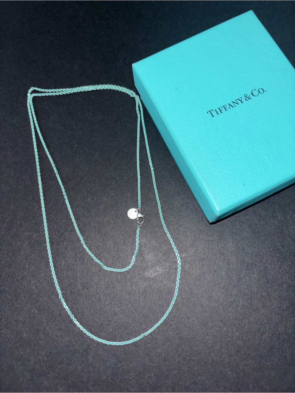 Tiffany & Co. Double-Layer Necklace with Signature Blue Cord and Silver Accents